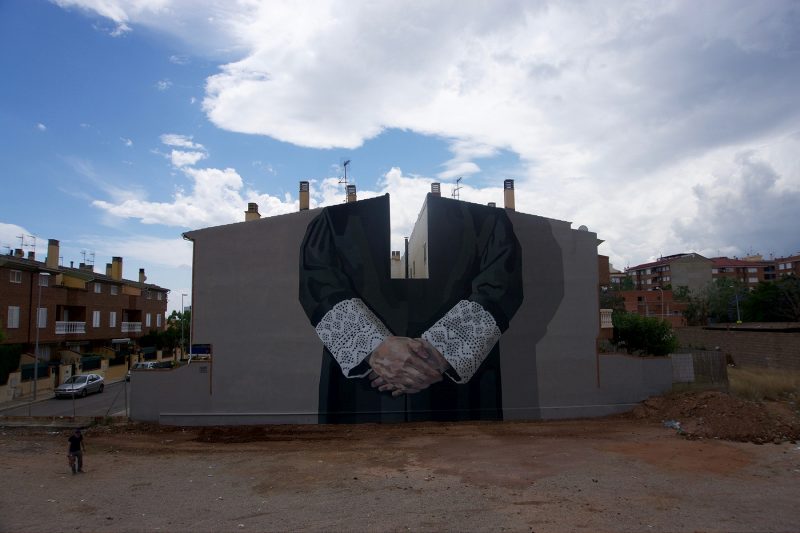 Personal complexities explored through monumental murals by Hyuro