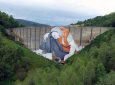 A Massive Mural by Ella & Pitr Depicts a Refugee Seeking Passage in France