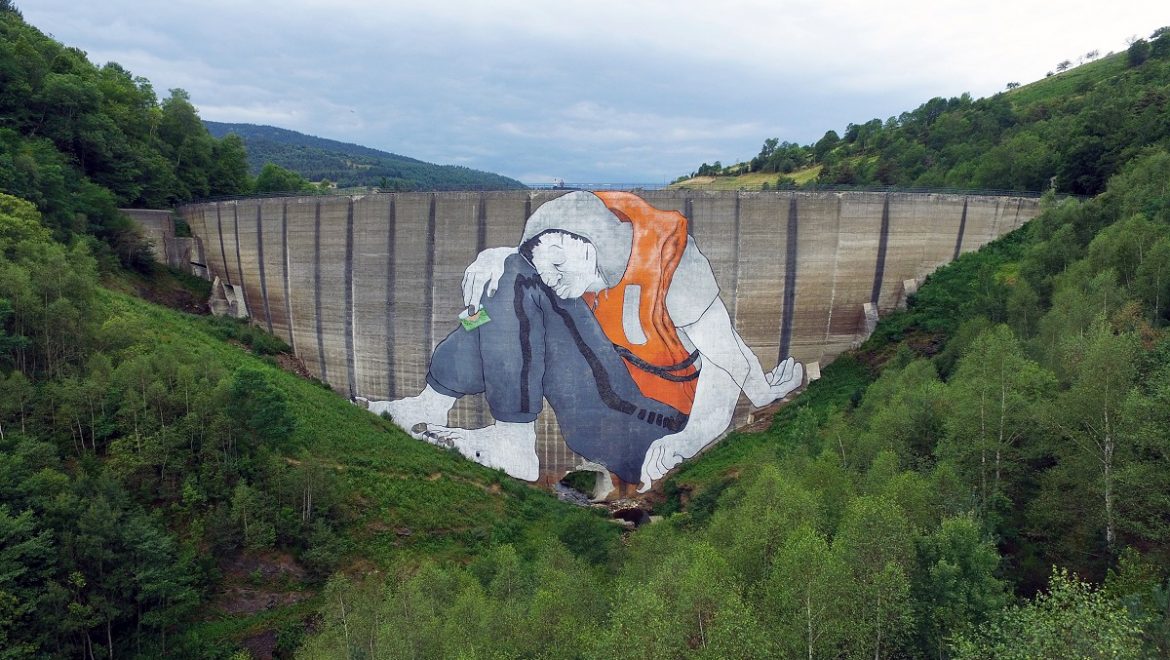 A Massive Mural by Ella & Pitr Depicts a Refugee Seeking Passage in France